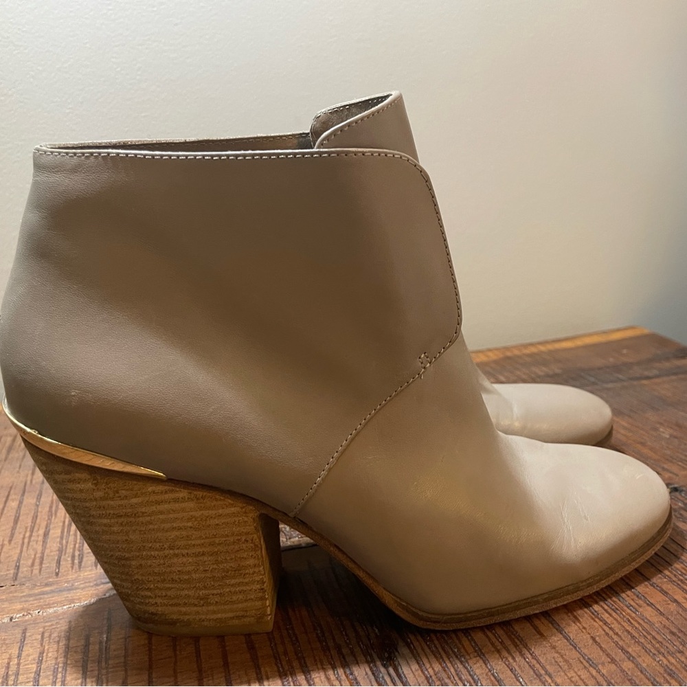 Cole Haan ankle boots.